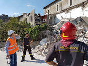Live, "Take You There" Report from Italy Earthquake Scene