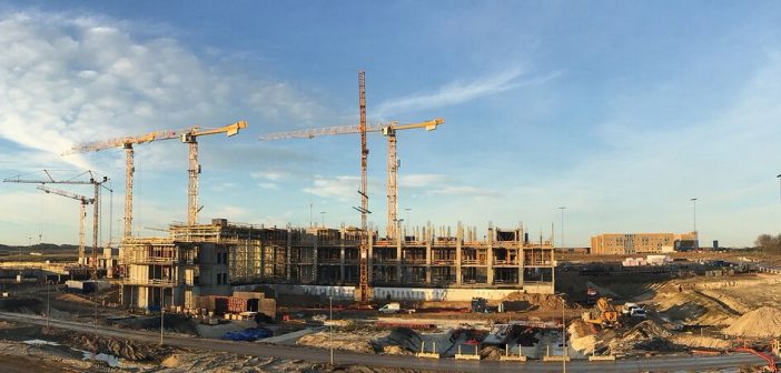 A Novel Solution for 3D Mapping Construction Sites: Put a Camera on a Crane