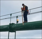 Steeplejacks Climb Cables, Chip Ice to Help Restore Mackinac Bridge Service