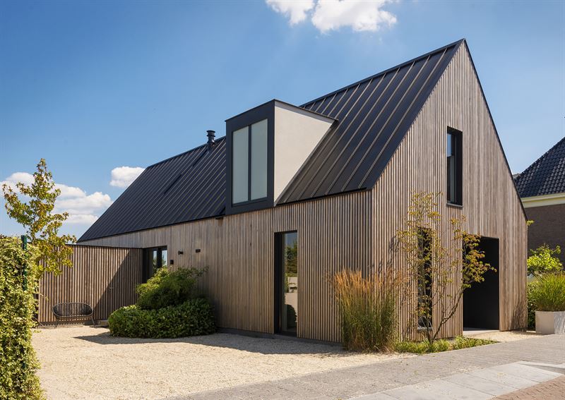 Sustainable Longhouse with Roof Made from GreenCoat® Steel Shown on Dutch Television