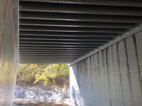 A Decade Later, Inspection Shows Eight Mile Road’s FRP Bridge Deck and Beam System In “Like New” Condition