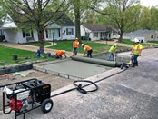Curb Roller Manufacturing Makes Concrete Work Easy with the Hydra-Screed HS3000