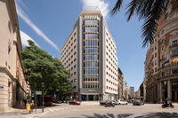 Integral refurbishment of BBVA's bank headquarters in Valencia by Miriam Castells Studio