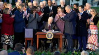Biden signs bipartisan infrastructure bill with Republicans on hand to celebrate win
