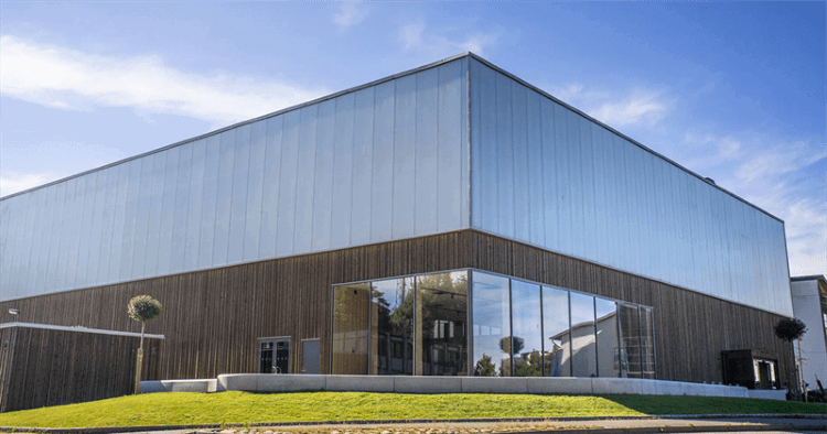 A temporary wooden market hall gets a new life as a sports hall in Sweden’s largest reuse project
