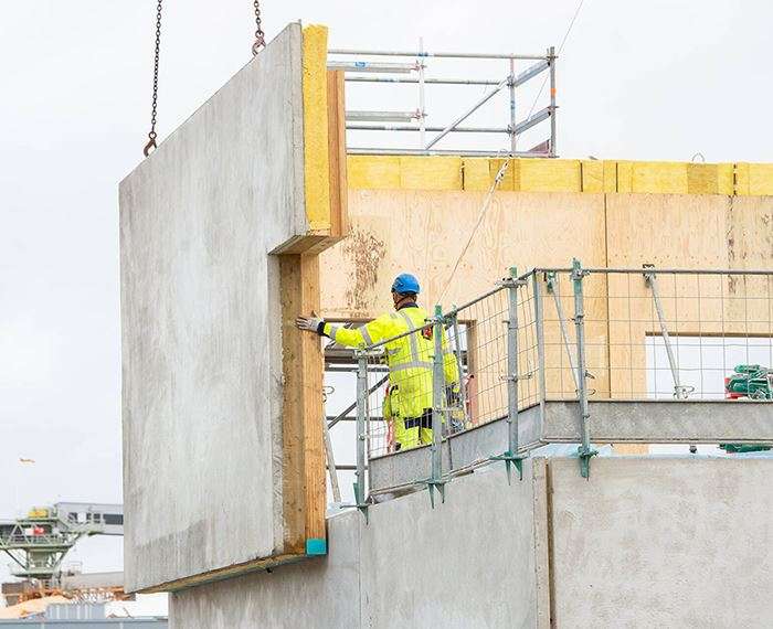 Precast concrete and wood products company are working together with a house builder to find low-carbon solutions in construction