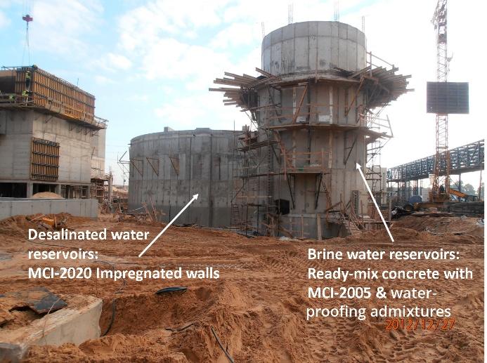 A construction site with several water tanks<br />
<br />
AI-generated content may be incorrect.