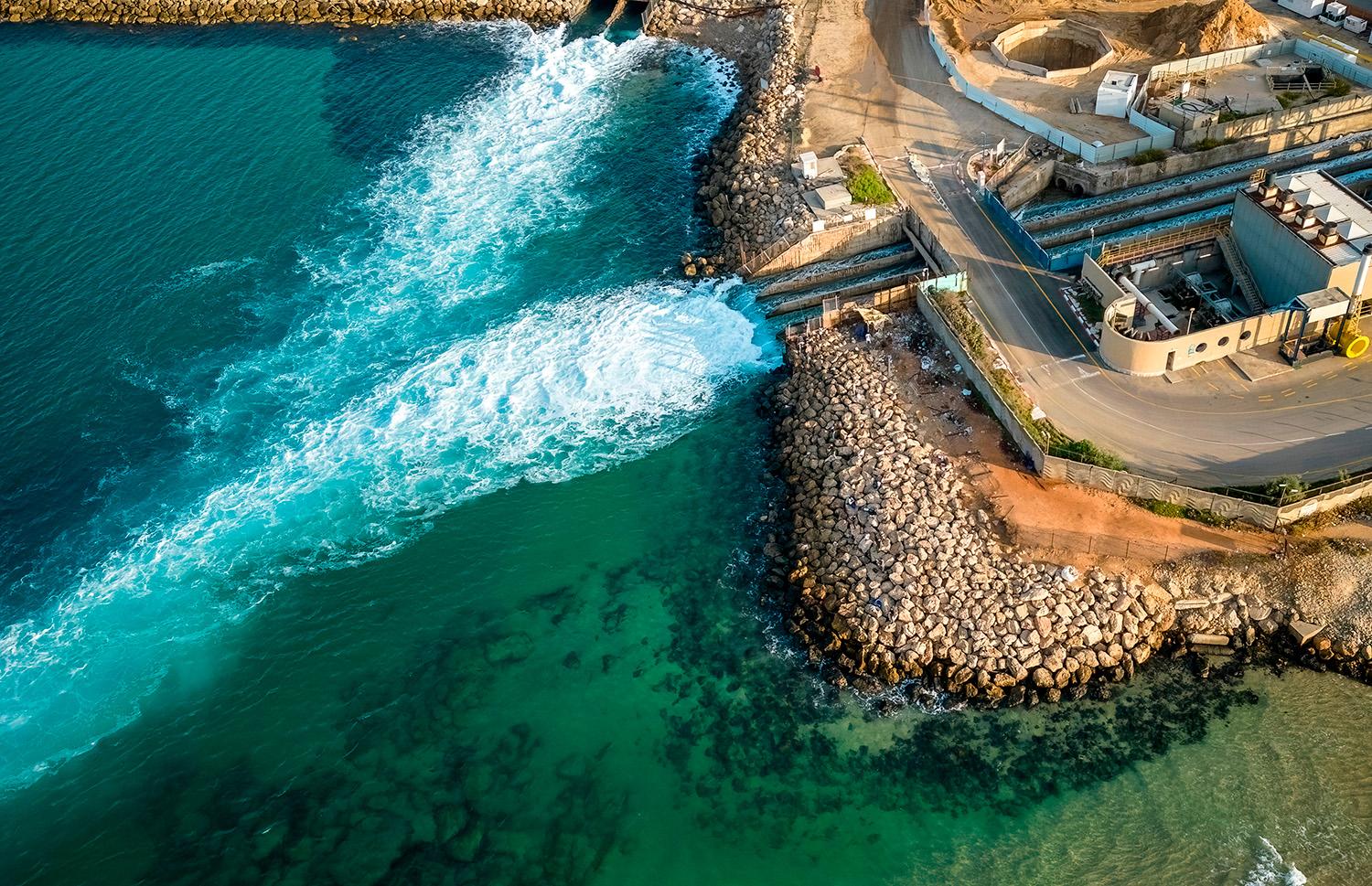 A water flowing out of a dam<br />
<br />
AI-generated content may be incorrect.